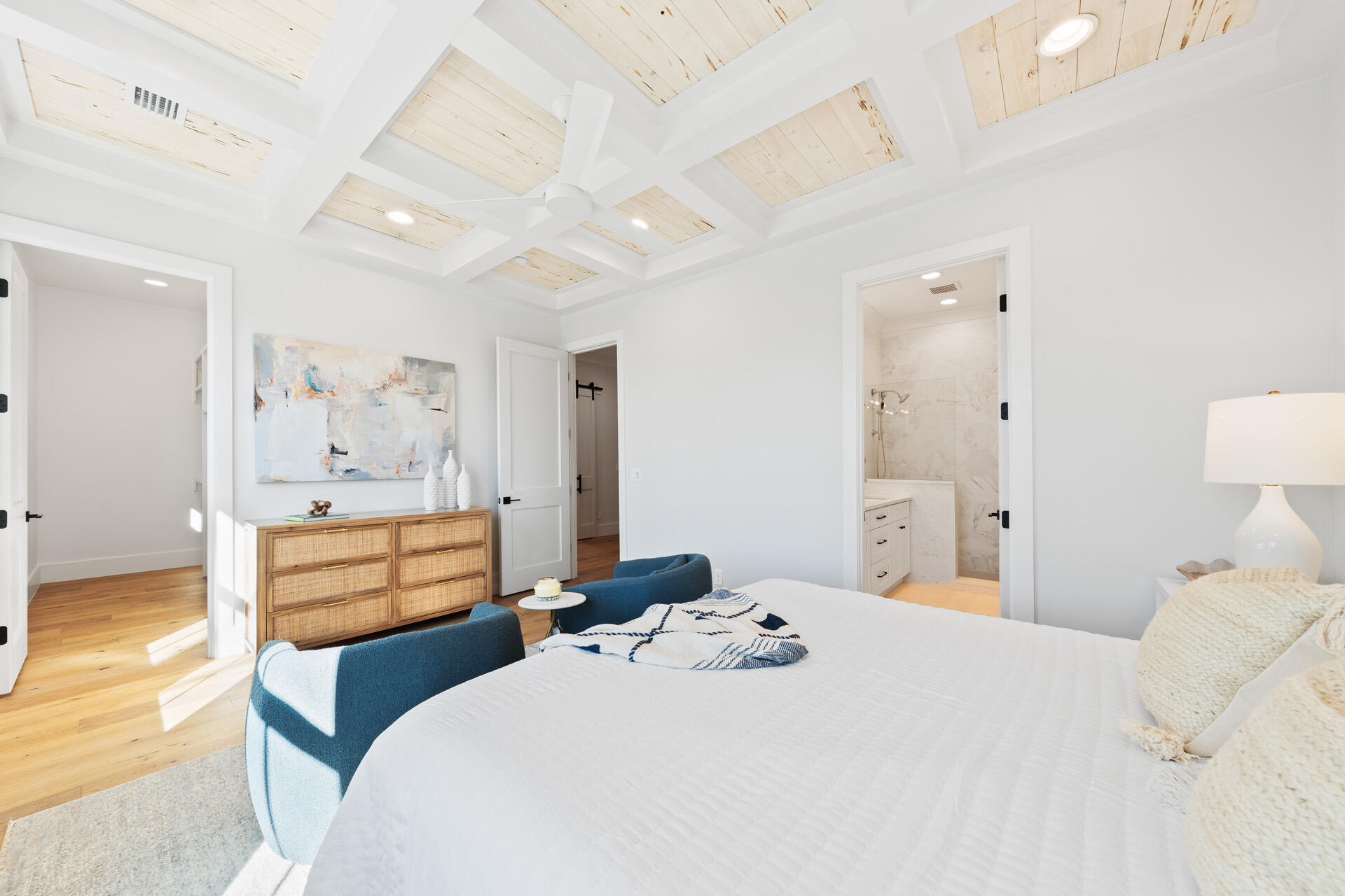 520 South County Highway 393, Unit 39A Santa Rosa Beach, FL 32459 - Photo 21 of 47 a bedroom with a bed and wooden floor