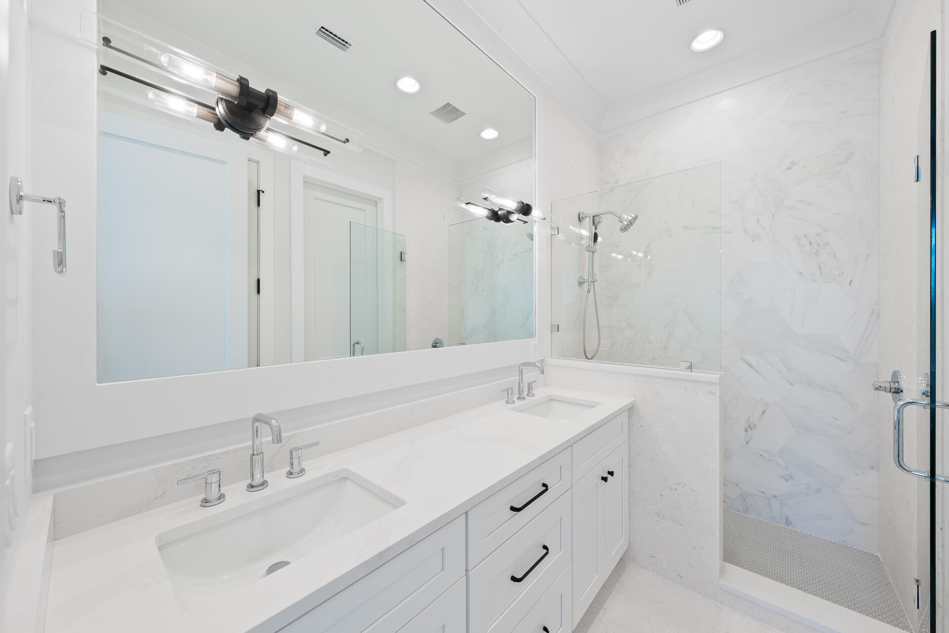 520 South County Highway 393, Unit 39A Santa Rosa Beach, FL 32459 - Photo 22 of 47 a bathroom with a double vanity sink mirror and shower