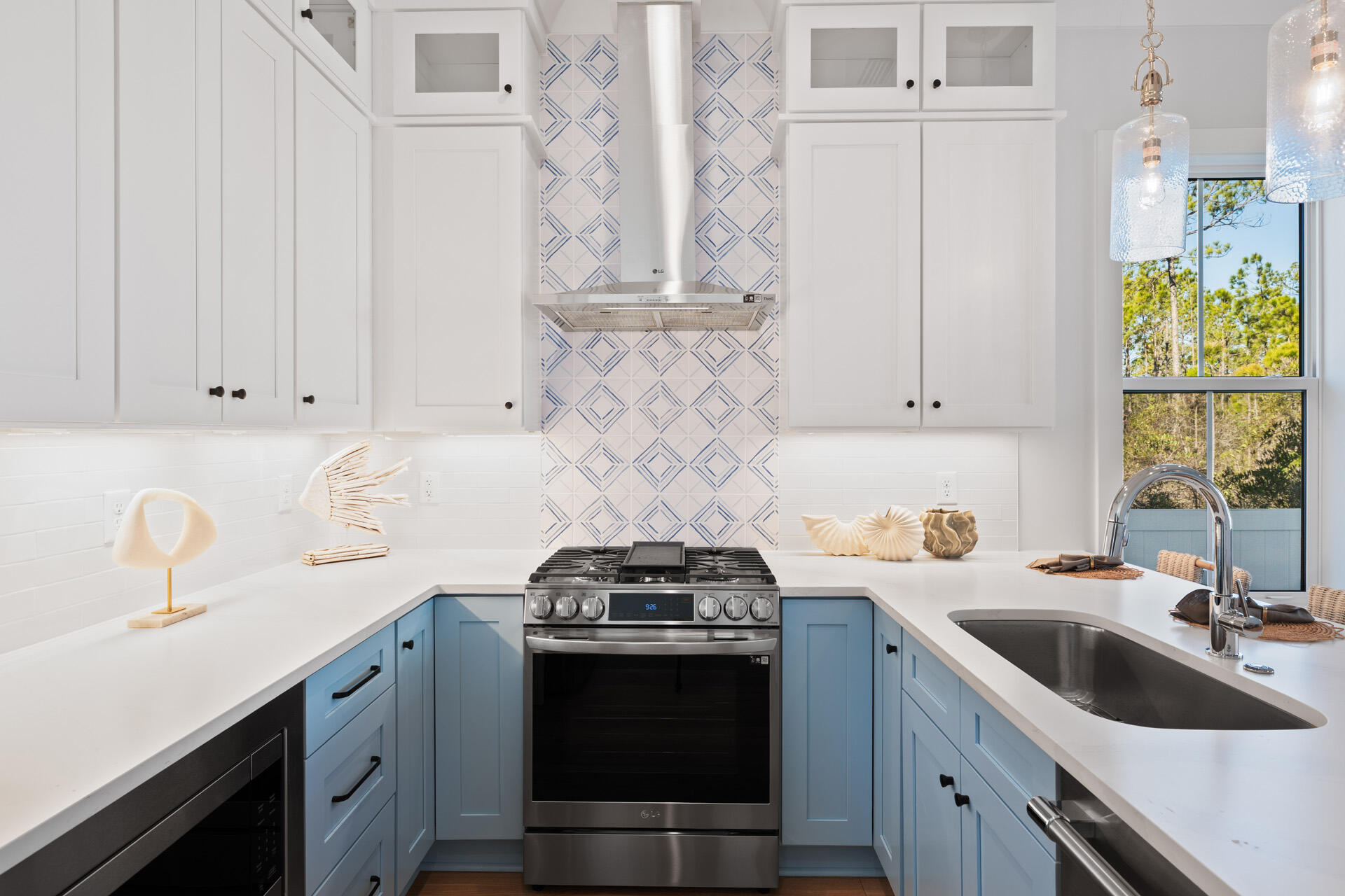 520 South County Highway 393, Unit 39A Santa Rosa Beach, FL 32459 - Photo 8 of 47 a kitchen with stainless steel appliances granite countertop a sink stove and cabinets
