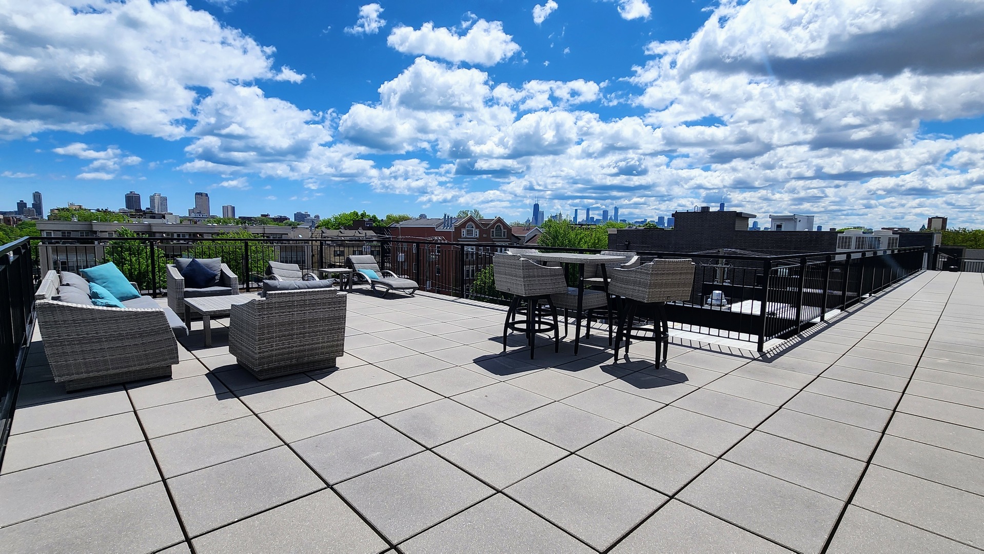 1409 West Diversey Parkway, Unit 320 Chicago, IL 60614 - Photo 2 of 13 a view of roof deck with seating area and city view