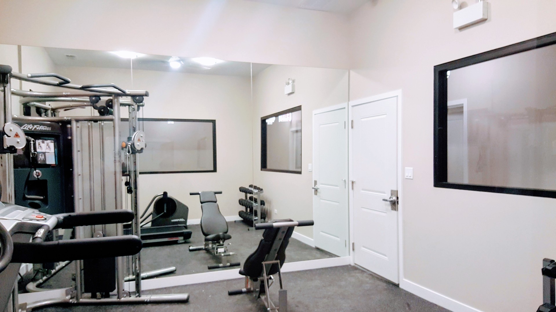 1409 West Diversey Parkway, Unit 320 Chicago, IL 60614 - Photo 4 of 13 a view of a room with gym equipment