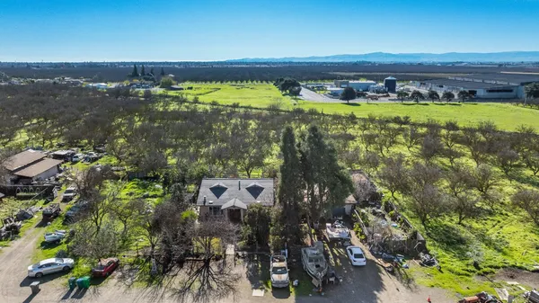 a view of a large body of water with a building in the background