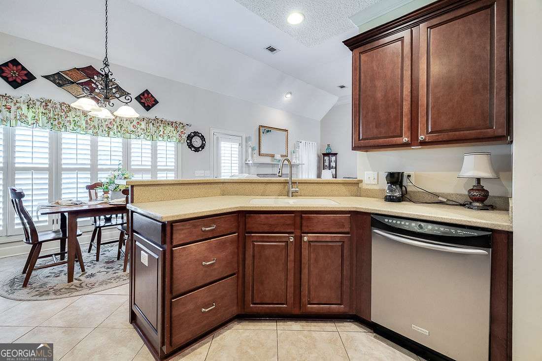 110 Cobbleton Drive Rincon, GA 31326 - Photo 16 of 41 a kitchen with a sink cabinets and window