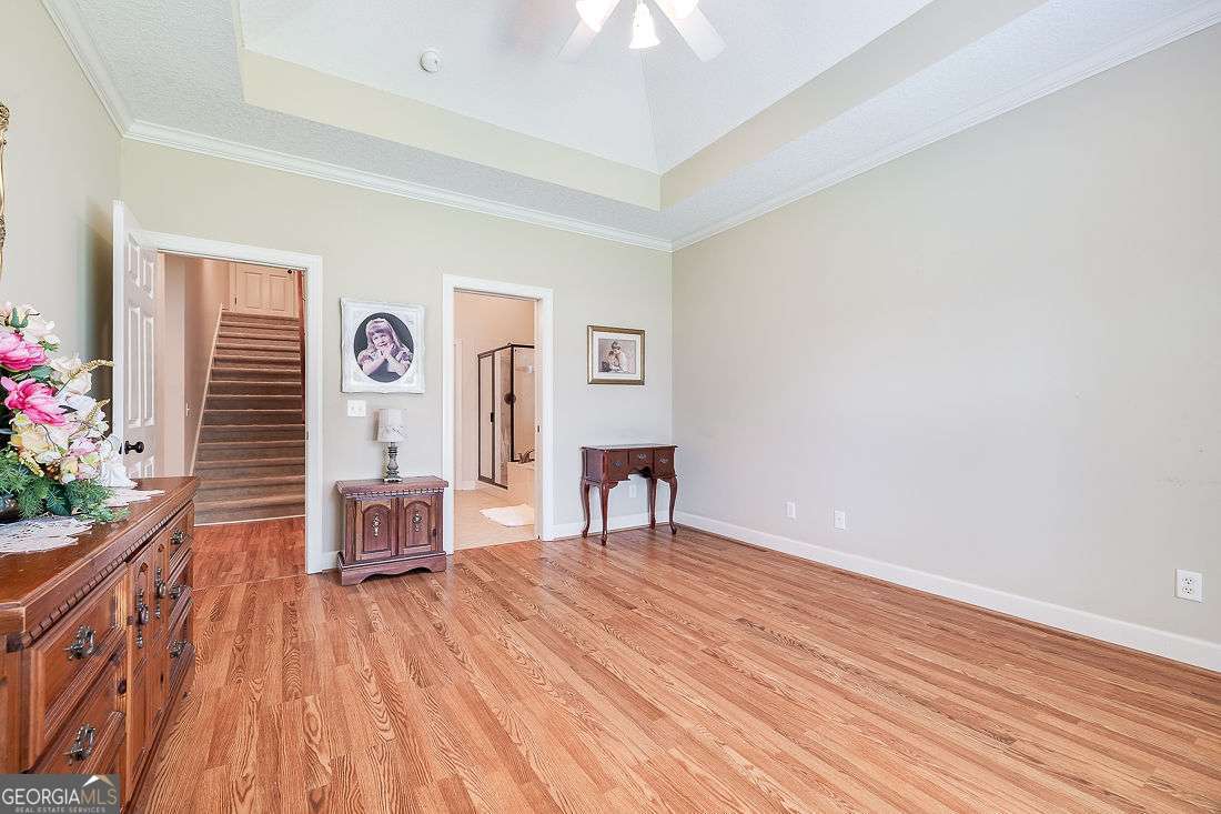 110 Cobbleton Drive Rincon, GA 31326 - Photo 23 of 41 a view of a room with wooden floor and furniture