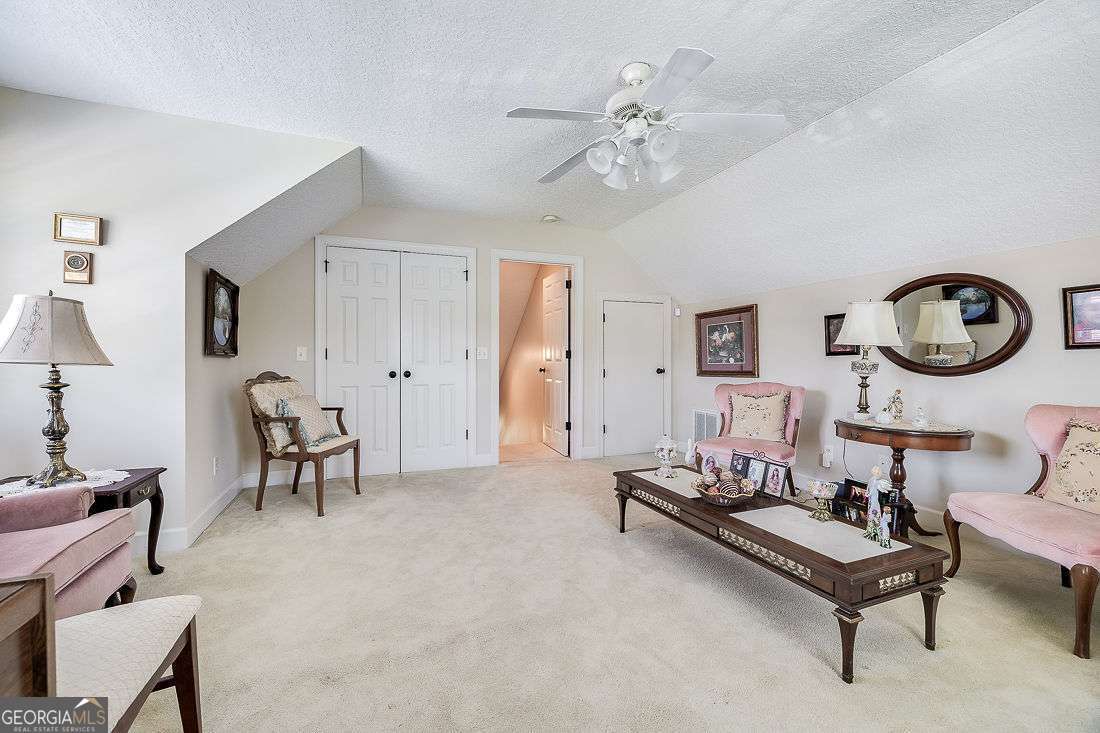 110 Cobbleton Drive Rincon, GA 31326 - Photo 32 of 41 a living room with furniture and a table