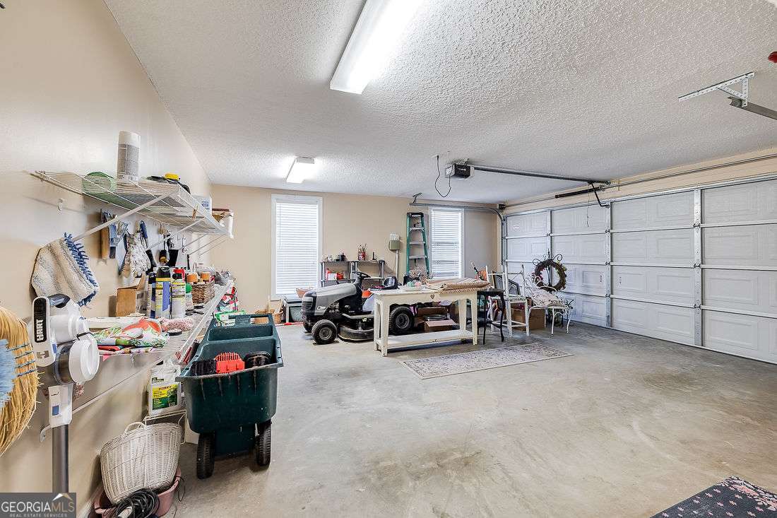110 Cobbleton Drive Rincon, GA 31326 - Photo 35 of 41 a view of a livingroom with furniture and a window