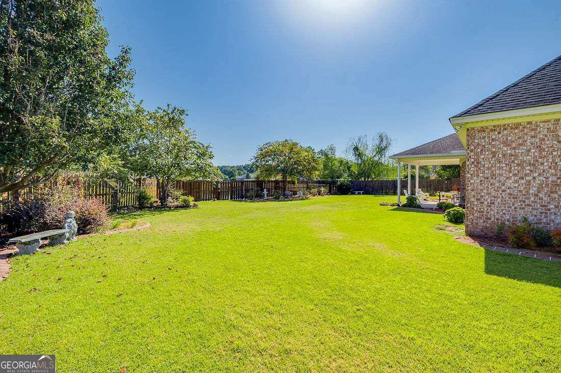 110 Cobbleton Drive Rincon, GA 31326 - Photo 39 of 41 a view of a house with a backyard