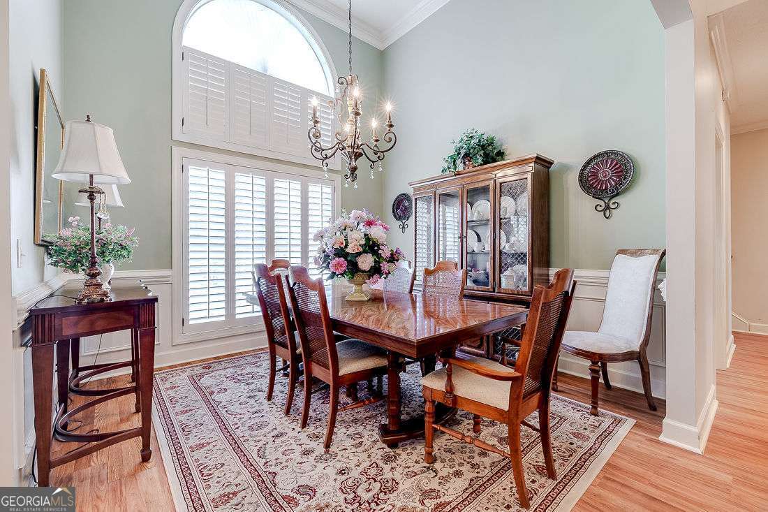 110 Cobbleton Drive Rincon, GA 31326 - Photo 8 of 41 a view of a dining room with furniture window and wooden floor