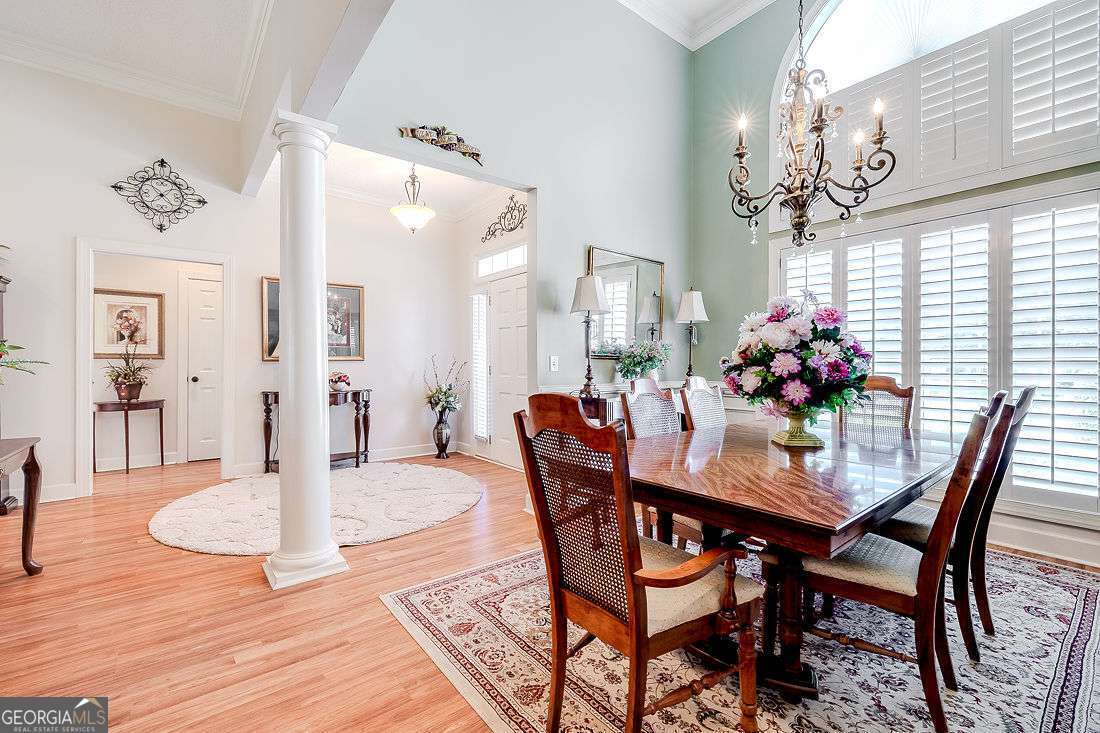 110 Cobbleton Drive Rincon, GA 31326 - Photo 9 of 41 a dining room with furniture and window