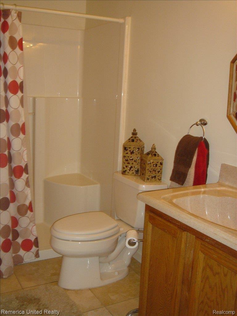 58600 12 Mile Road New Hudson, MI 48165 - Photo 9 of 14 Bathroom