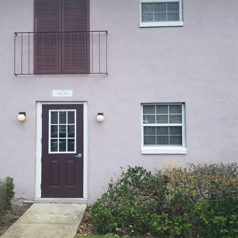 525 South Conway Road, Unit 73 Orlando, FL 32807 - Photo 1 of 1 a view of front door of house