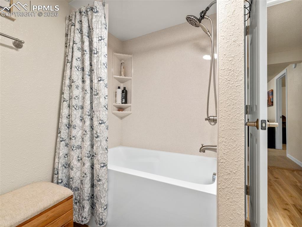 20 Robertson Road Pueblo, CO 81001 - Photo 24 of 39 a bathroom with a bathtub and a shower