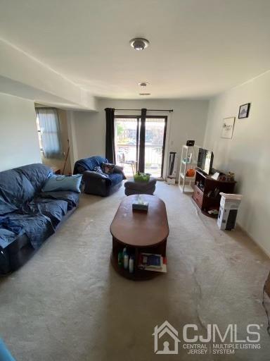 1621 Raspberry Court Edison, NJ 08817 - Photo 2 of 8 a living room with furniture window and a table