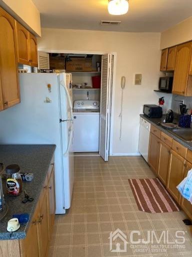 1621 Raspberry Court Edison, NJ 08817 - Photo 3 of 8 a kitchen with stainless steel appliances granite countertop a refrigerator and a stove