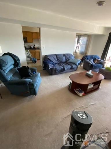 1621 Raspberry Court Edison, NJ 08817 - Photo 5 of 8 a living room with furniture and a lamp