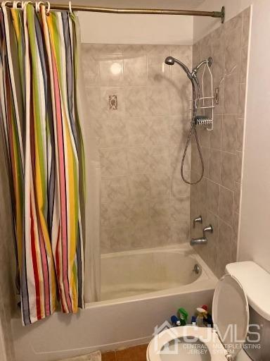 1621 Raspberry Court Edison, NJ 08817 - Photo 8 of 8 a bathroom with a tub and a shower curtain