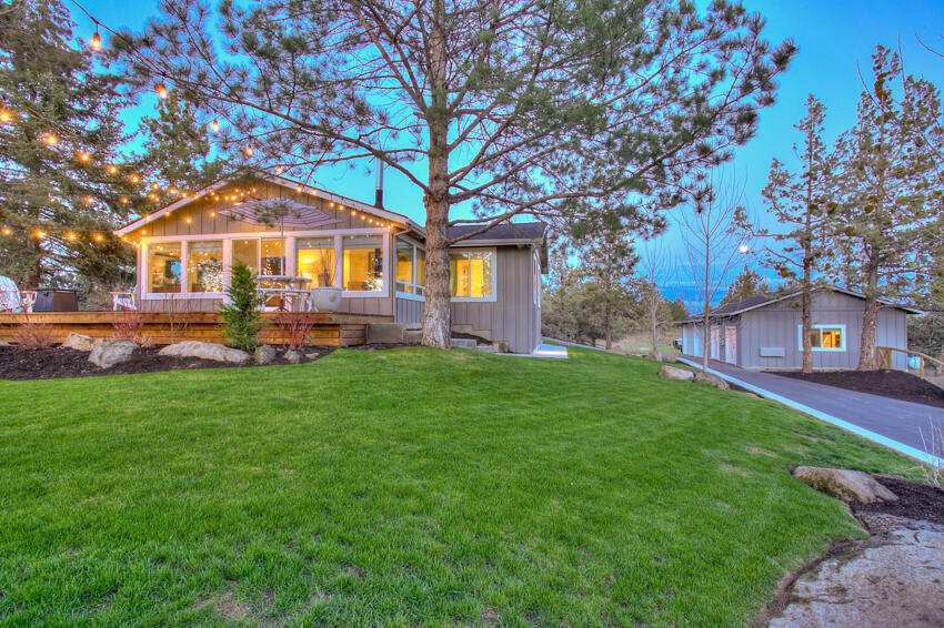63210 Overtree Road Bend, OR 97701 - Photo 8 of 9 a front view of a house with a yard