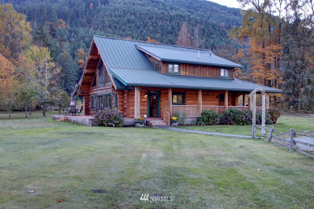 4567 Mosquito Lake Road Deming, WA 98244 - Photo 1 of 25 a front view of a house with a yard