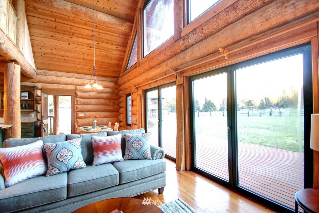 4567 Mosquito Lake Road Deming, WA 98244 - Photo 11 of 25 a living room with furniture and a large window