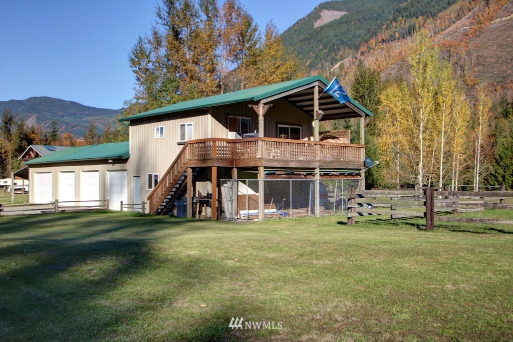4567 Mosquito Lake Road Deming, WA 98244 - Photo 19 of 25 a front view of a house with a yard