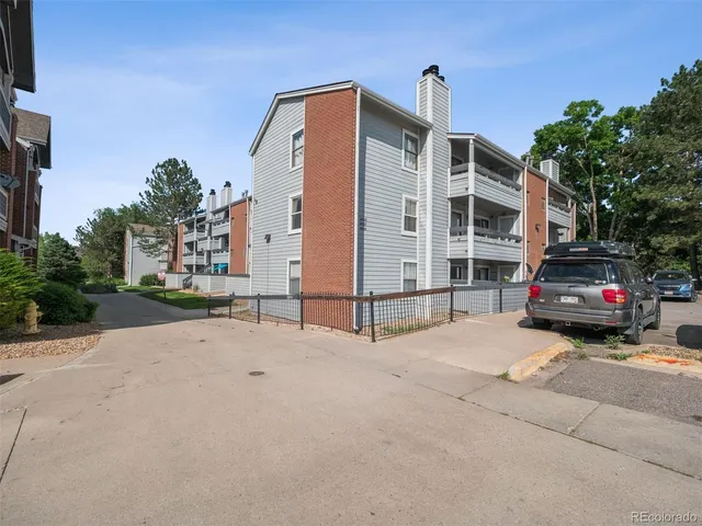 a view of a house with a street