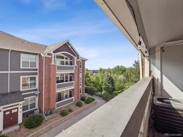 a view of a building from a balcony