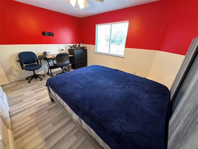 a balcony with table and chairs