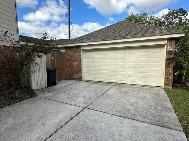 a view of a backyard of the house