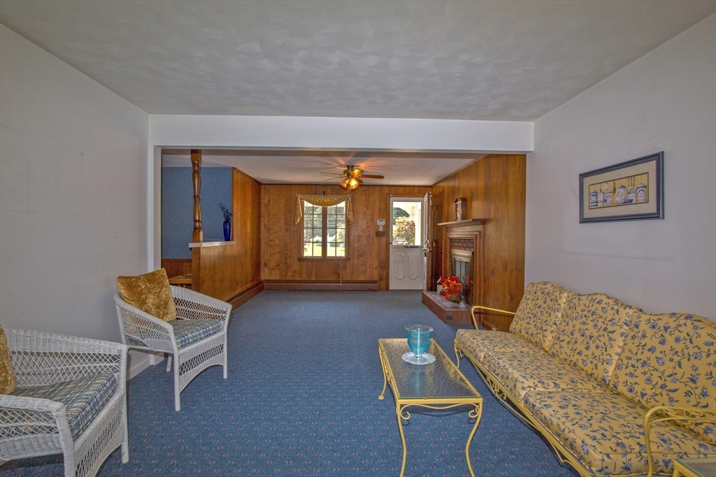 176 Wolf Swamp Road Longmeadow, MA 01106 - Photo 14 of 40 a living room with furniture and a window