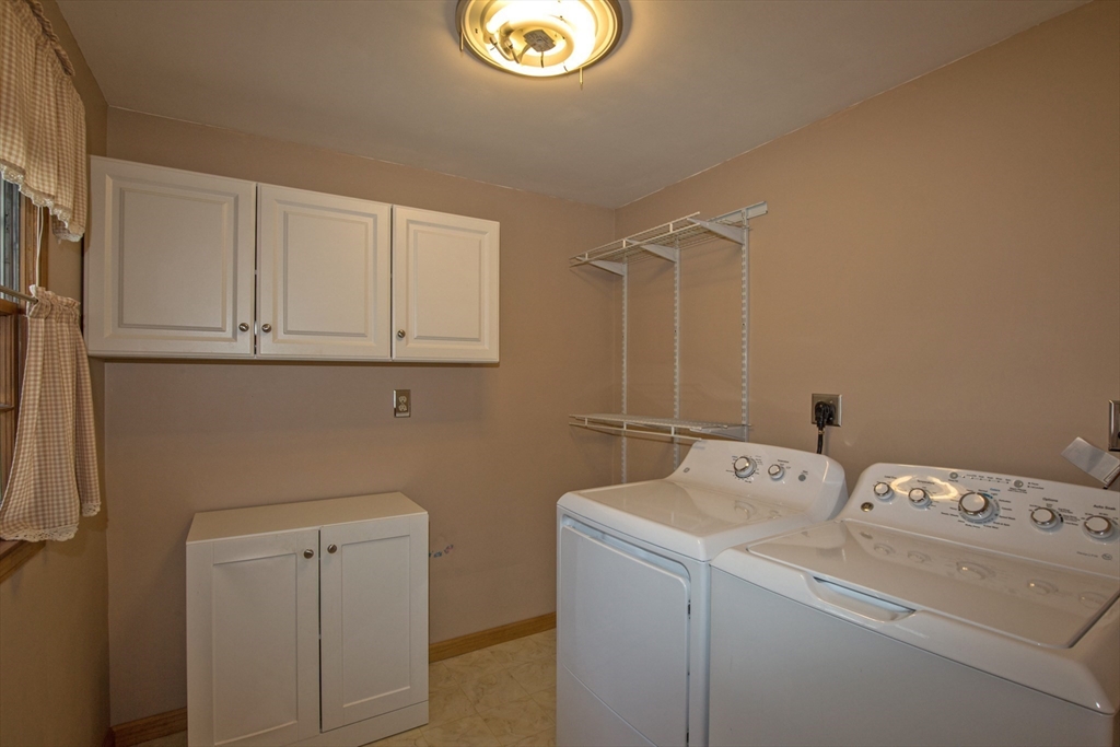 176 Wolf Swamp Road Longmeadow, MA 01106 - Photo 18 of 40 a utility room with dryer and washer