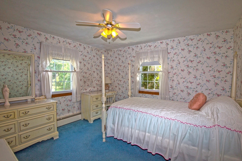 176 Wolf Swamp Road Longmeadow, MA 01106 - Photo 19 of 40 a bedroom with a bed and a window