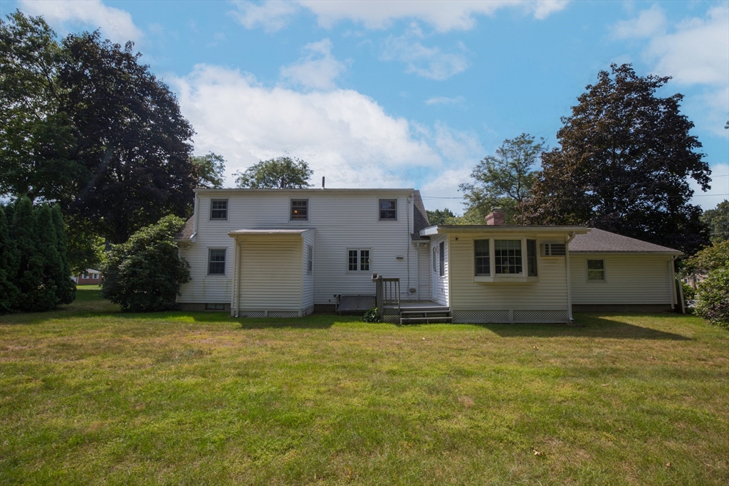 176 Wolf Swamp Road Longmeadow, MA 01106 - Photo 34 of 40 a view of a house with a yard and a large tree