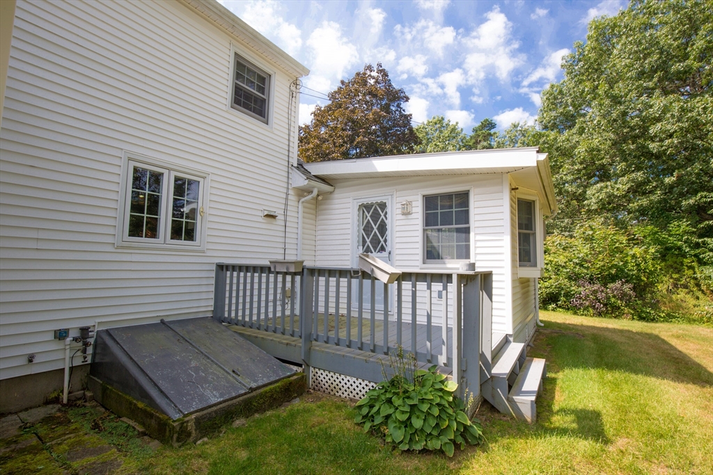 176 Wolf Swamp Road Longmeadow, MA 01106 - Photo 36 of 40 a view of a wooden deck with a yard