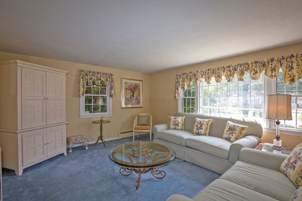 176 Wolf Swamp Road Longmeadow, MA 01106 - Photo 5 of 40 a living room with furniture and a large window