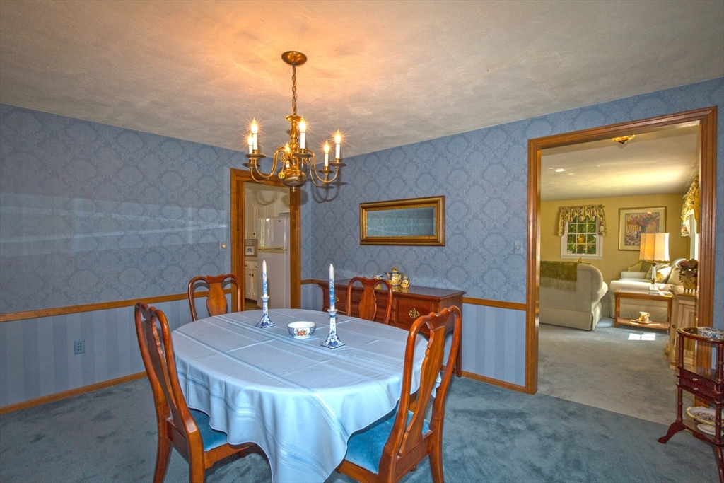 176 Wolf Swamp Road Longmeadow, MA 01106 - Photo 6 of 40 a view of a dining room with furniture