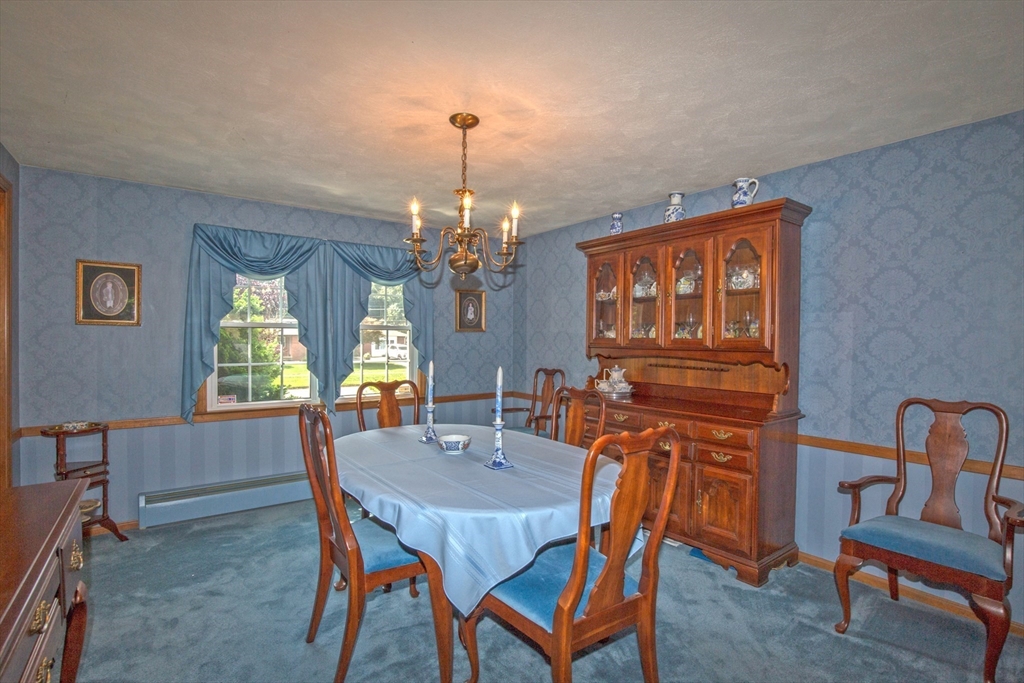 176 Wolf Swamp Road Longmeadow, MA 01106 - Photo 7 of 40 a view of a dining room with furniture window and wooden floor