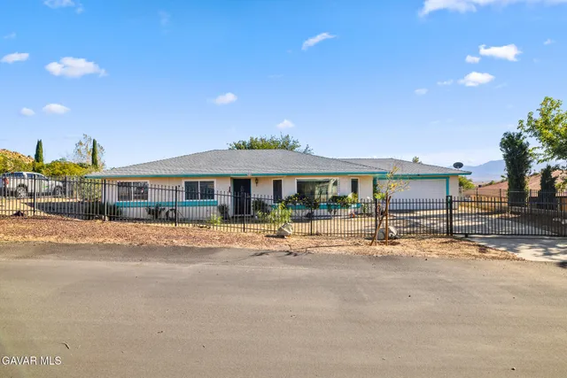 a front view of building with street