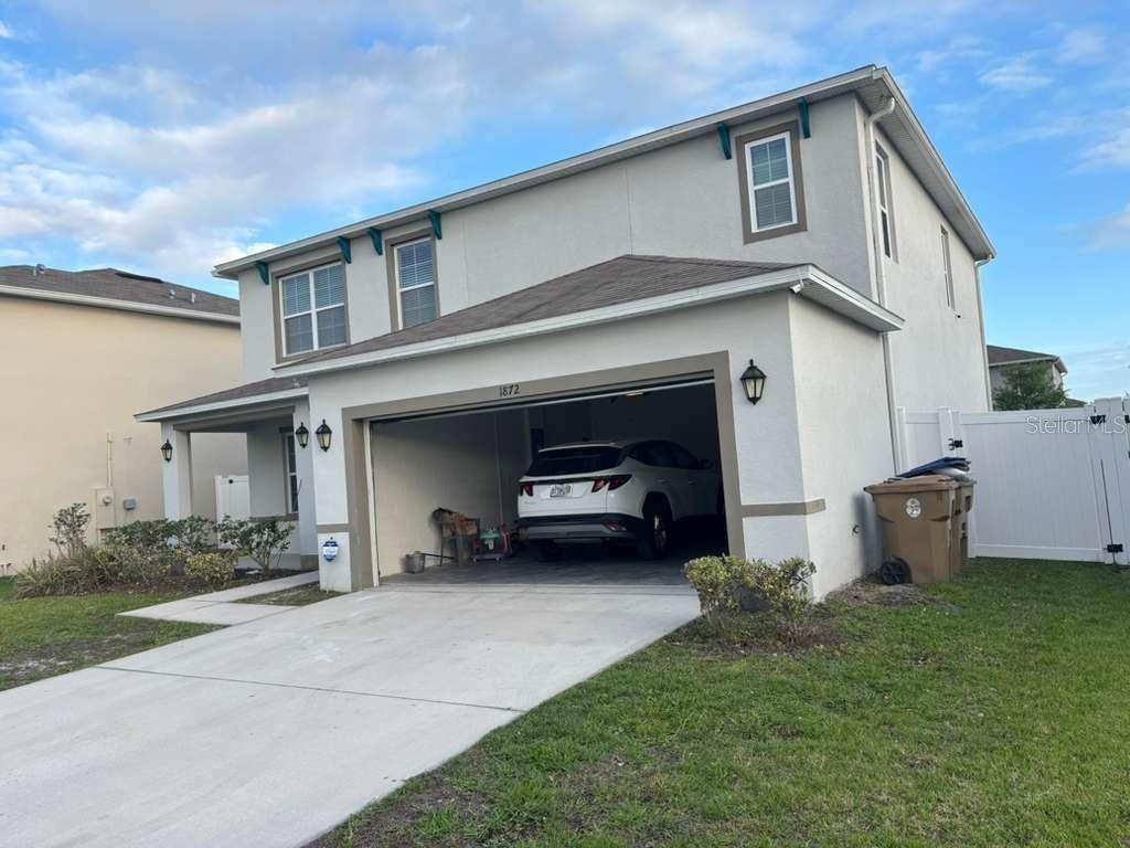 1872 Rustic Falls Drive Kissimmee, FL 34744 - Photo 2 of 30 a house view with a outdoor space