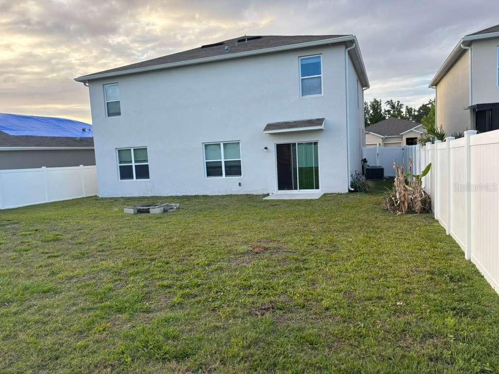 1872 Rustic Falls Drive Kissimmee, FL 34744 - Photo 5 of 30 a house view with a garden space
