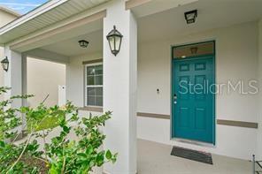1872 Rustic Falls Drive Kissimmee, FL 34744 - Photo 8 of 30 view of a entryway door front of house