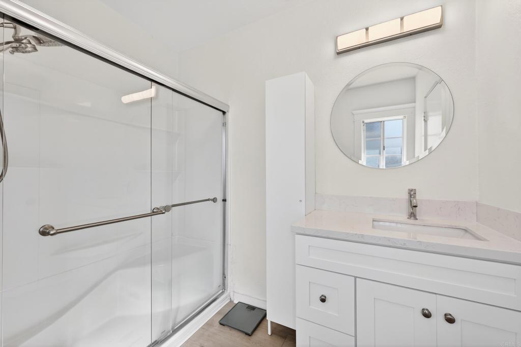 1530 East Appleton Street Long Beach, CA 90802 - Photo 39 of 61 a bathroom with a sink and a mirror