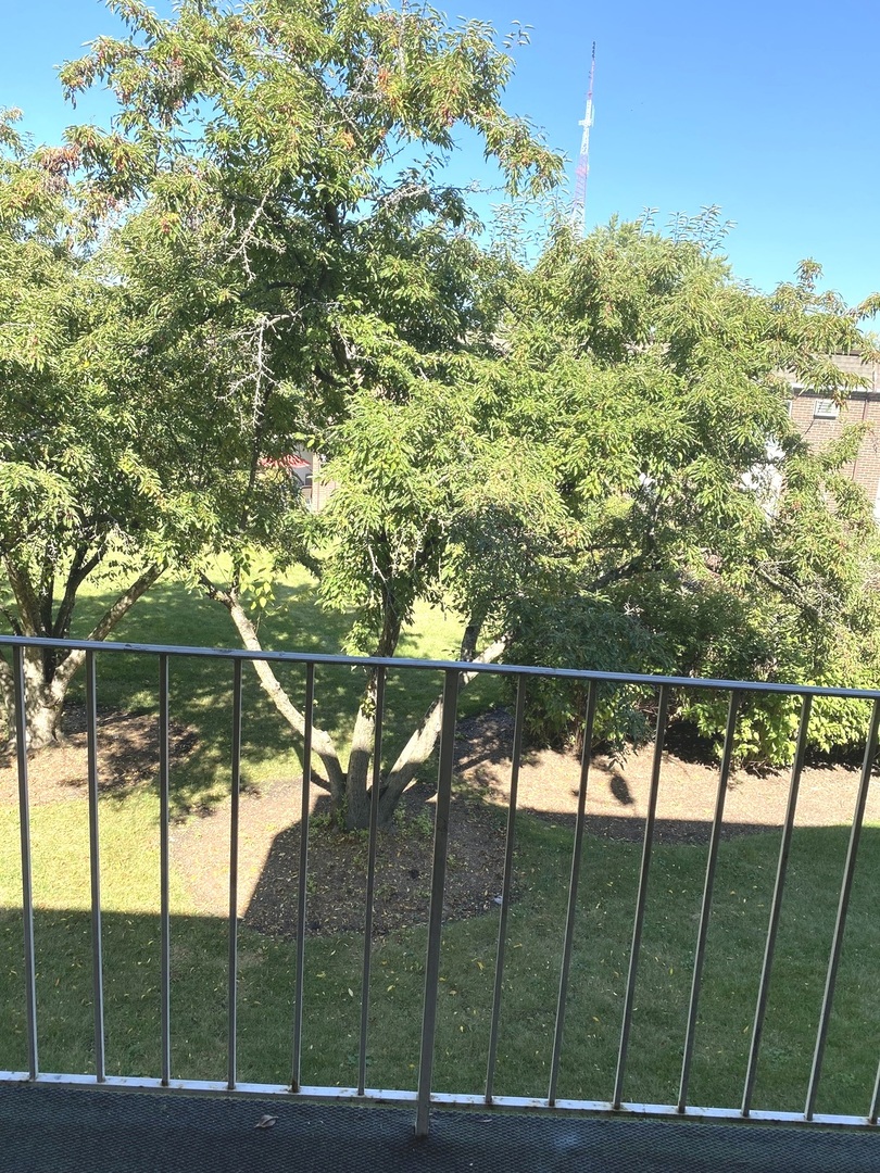 1149 Miller Lane, Unit 212 Buffalo Grove, IL 60089 - Photo 4 of 20 a view of outdoor space with a swimming pool
