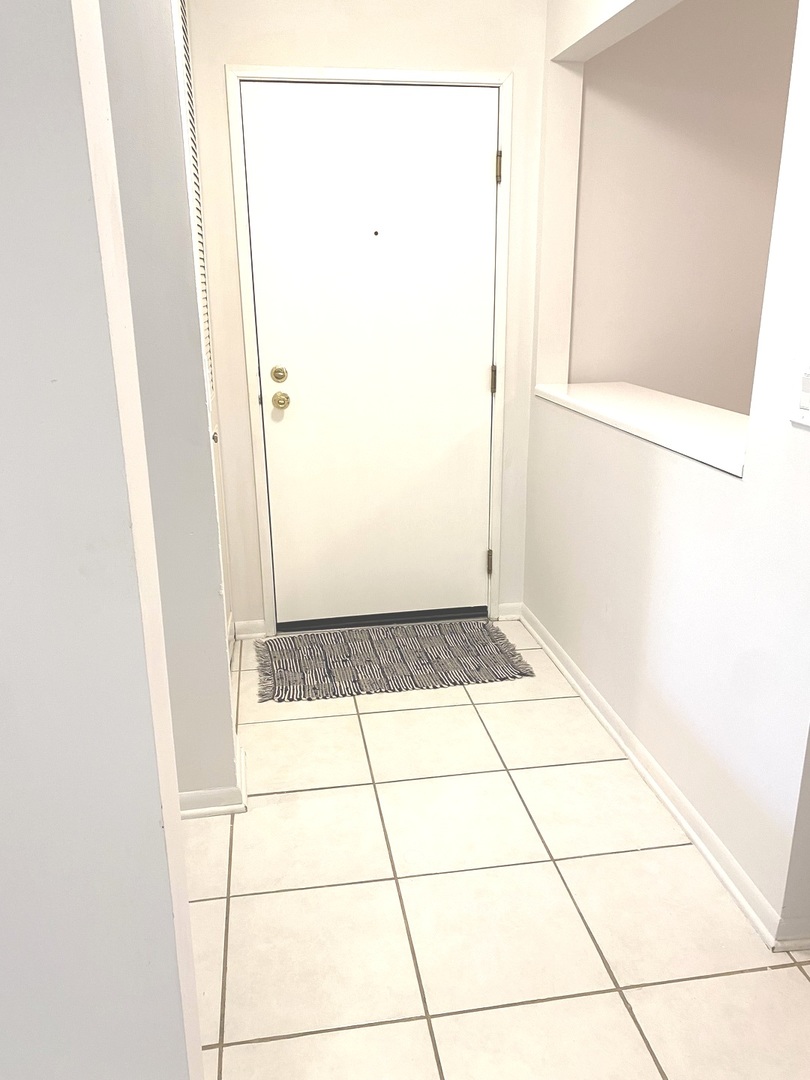 1149 Miller Lane, Unit 212 Buffalo Grove, IL 60089 - Photo 6 of 20 a view of an empty room