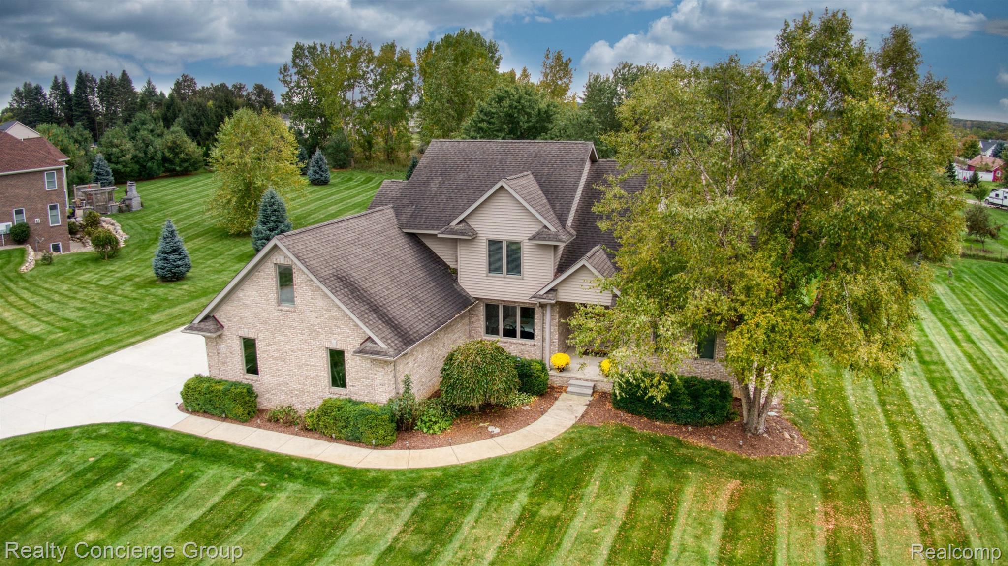 1172 Thorn Ridge Drive Howell, MI 48843 - Photo 61 of 71 Aerial view of home & property