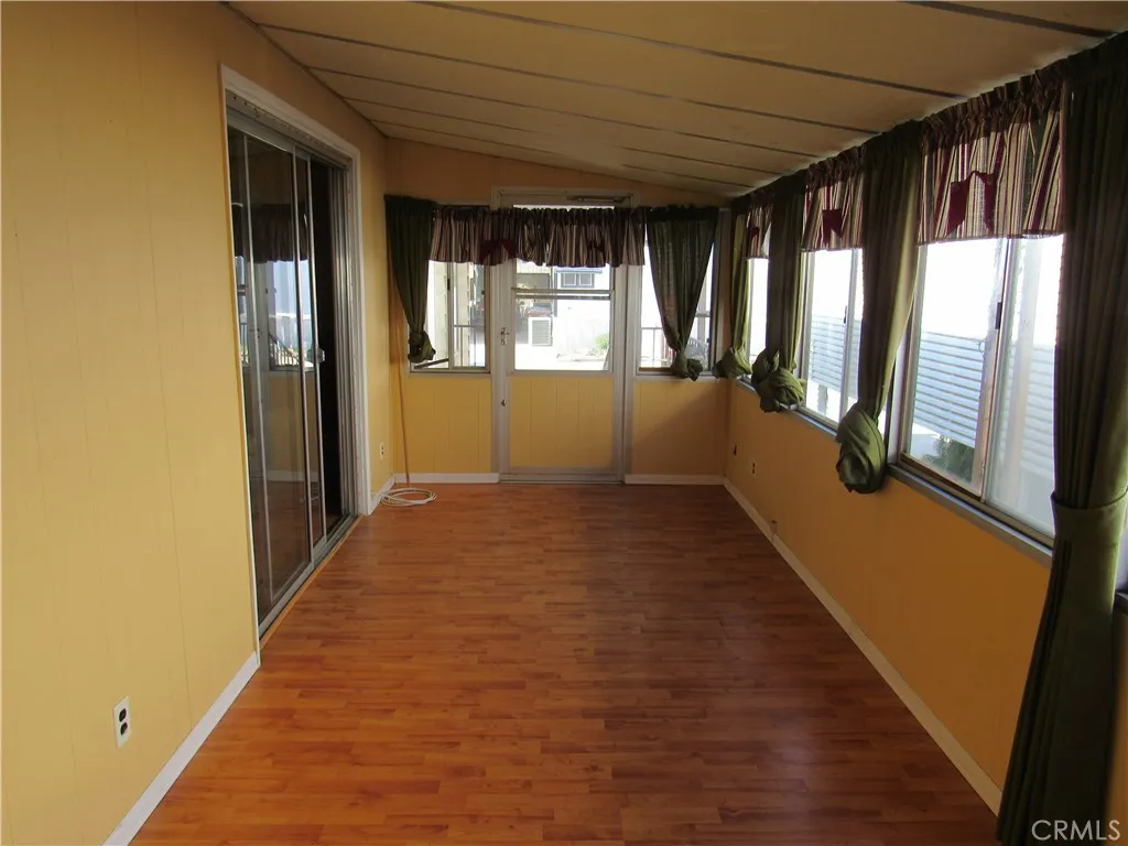 27701 Murrieta Road, Unit 6 Menifee, CA 92586 - Photo 12 of 28 a view of an empty room with a window