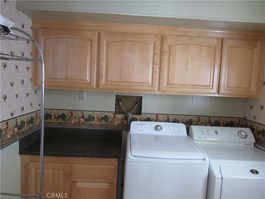 27701 Murrieta Road, Unit 6 Menifee, CA 92586 - Photo 17 of 28 a utility room with dryer and washer