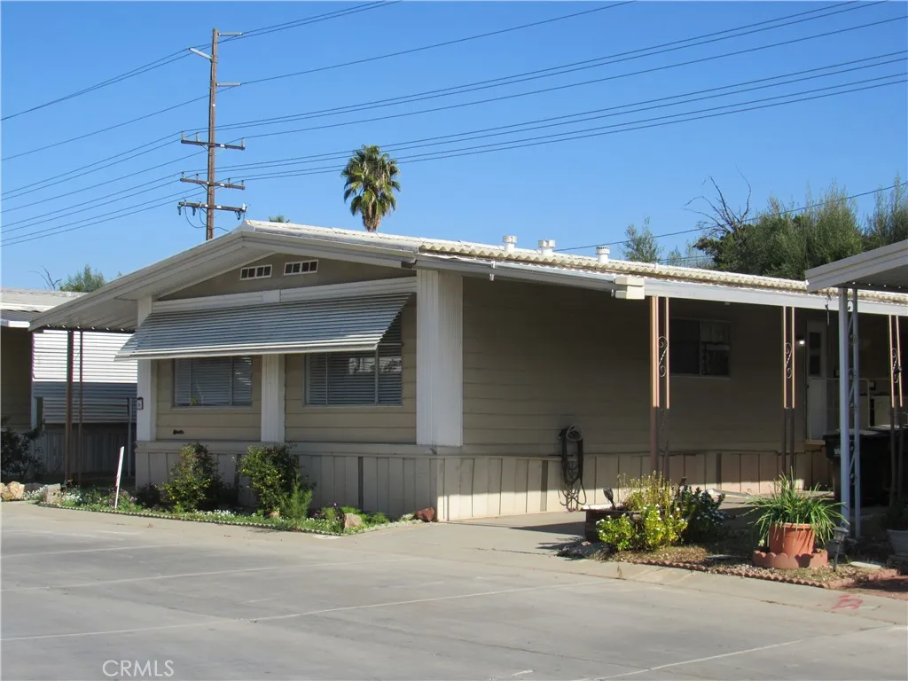 27701 Murrieta Road, Unit 6 Menifee, CA 92586 - Photo 2 of 28 a front view of a house with a yard
