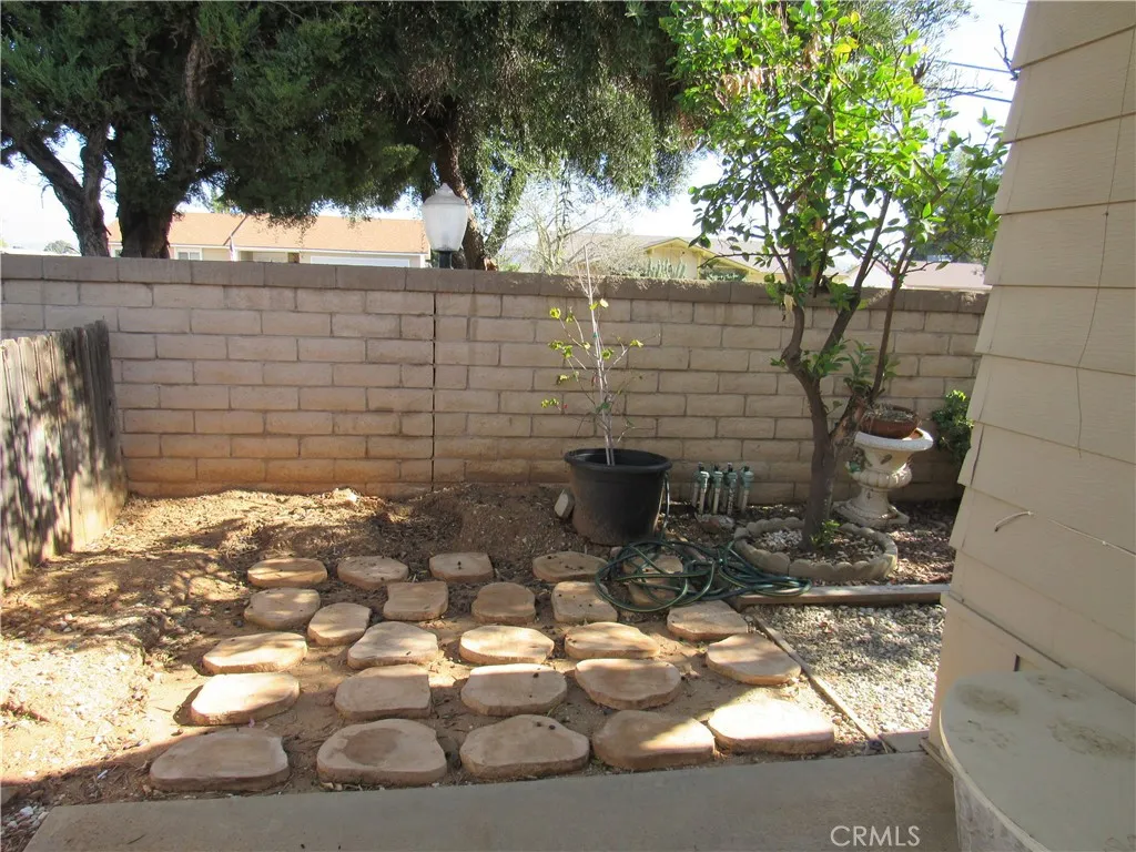 27701 Murrieta Road, Unit 6 Menifee, CA 92586 - Photo 24 of 28 a bathroom with a sink and a toilet