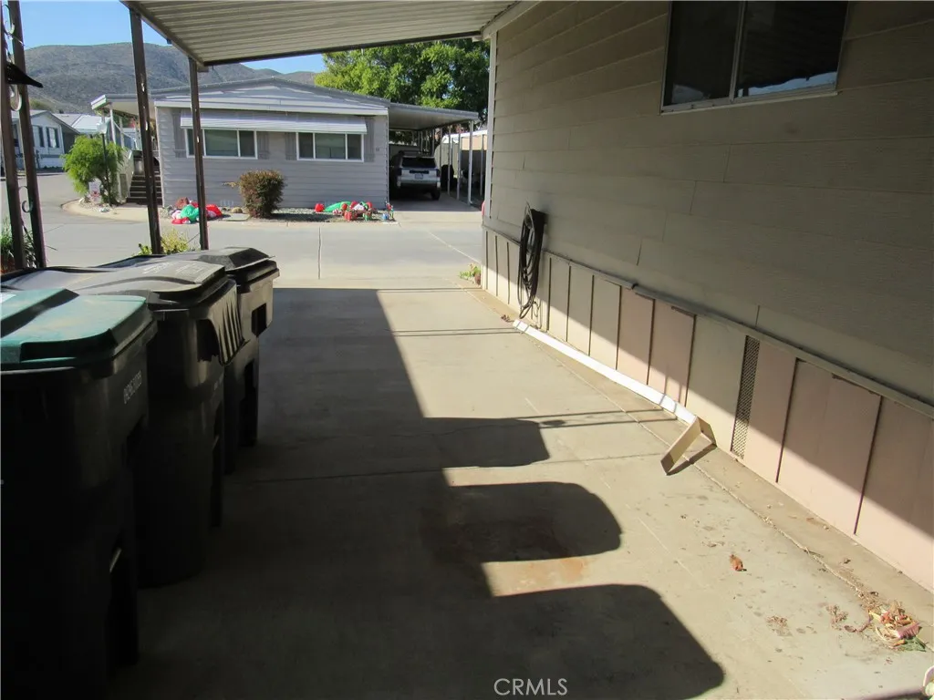 27701 Murrieta Road, Unit 6 Menifee, CA 92586 - Photo 27 of 28 a view of entryway and hall with wooden floor