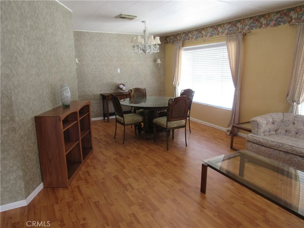27701 Murrieta Road, Unit 6 Menifee, CA 92586 - Photo 5 of 28 a view of a livingroom with furniture and a window